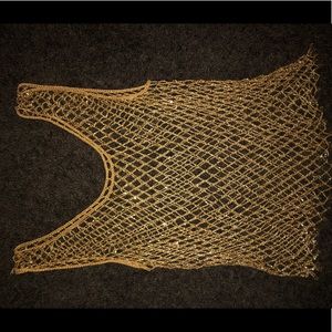 Gold beaded tank top.
